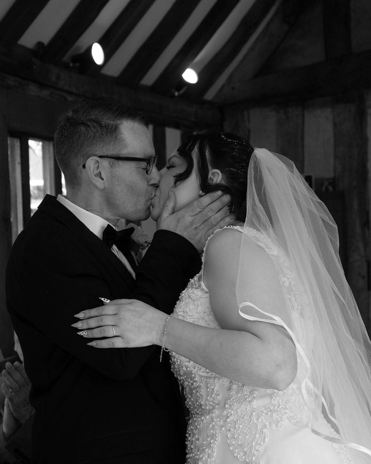 Black and white photograph of the first kiss