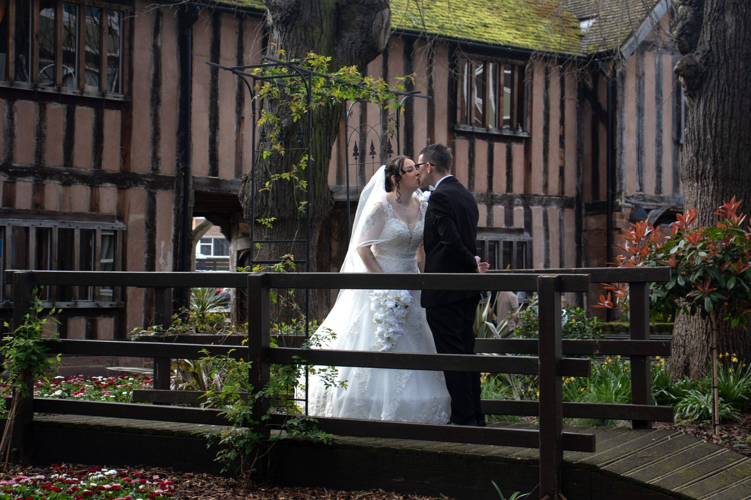 Checka and Matthew together on the bridge in the grounds