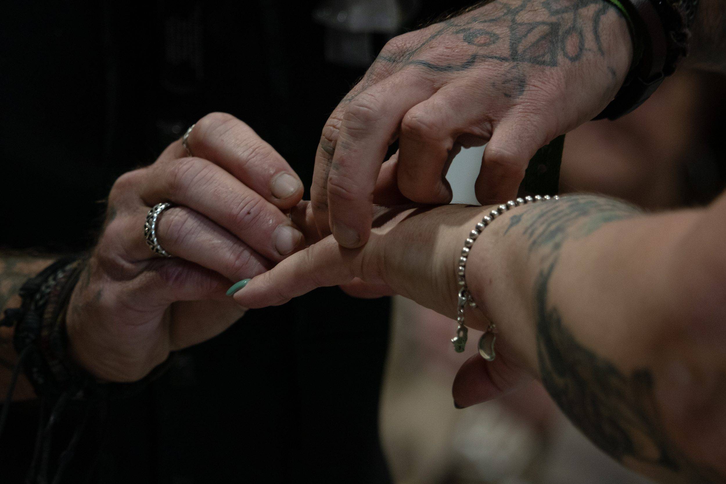 The ring going onto Natasha's finger during the ceremony