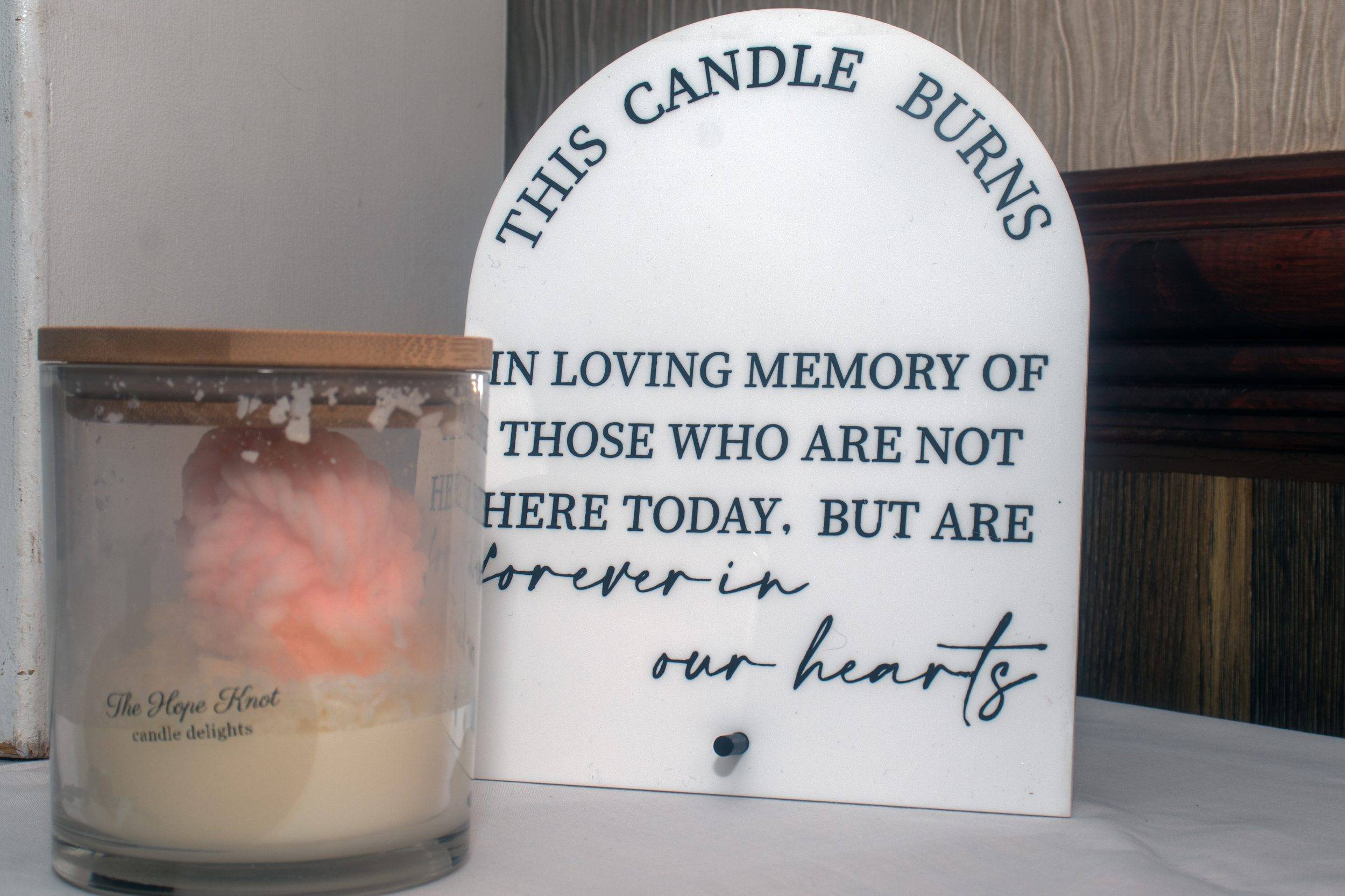 A candle lit in memory of those who could not be there